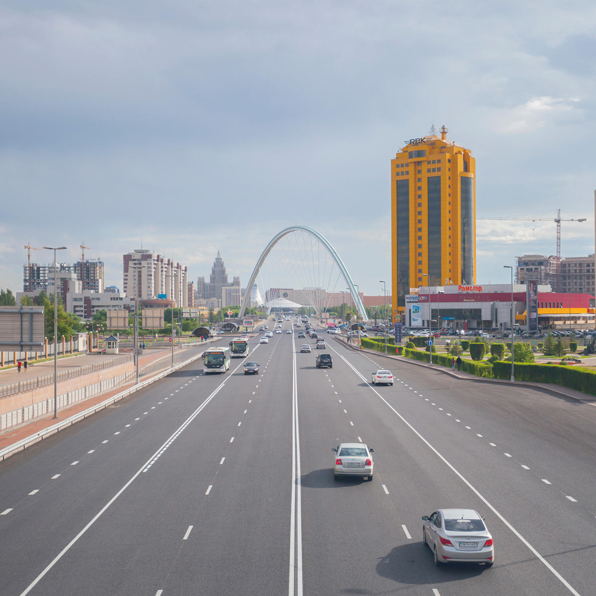 HY1YXM Barayev Street in Astana, on the road cars drive.